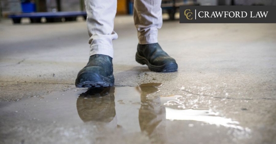 man slipping on water